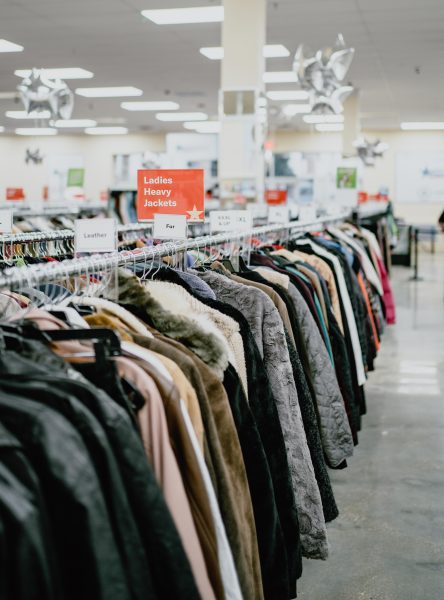 organized thrift store rack of jackets