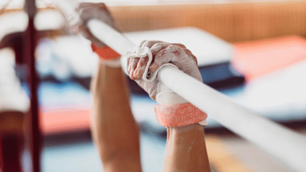 Close up of a Student’s Hands While Training For the Gymnastics Fundraiser